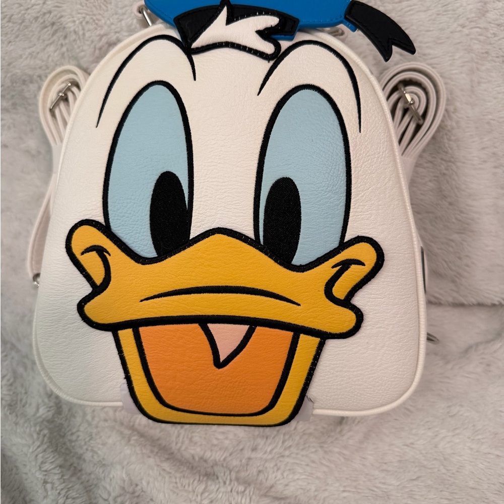 Reversible Donald & Daisy Loungefly backpack/crossbody. - Picture 2 of 13
